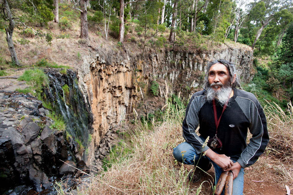 Several Trentham Landcare members recently attended  an interesting walk at Trentham Falls to learnabout the history and  geology of the area through indigenous eyes.Dja Dja Wurrung Elder Ricky Nelson performed a welcome to Country above the Falls.©Scheltema