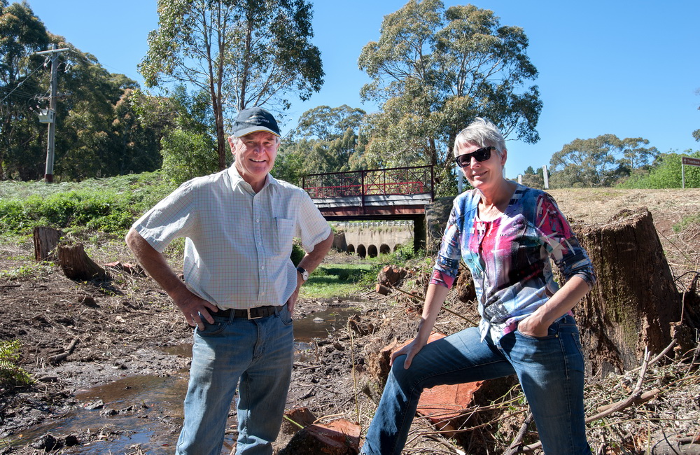 Michael Keaney and President of Trentham Landcare Patricia Scheltus at ENders Bridge where willow removal has begun.©Scheltema