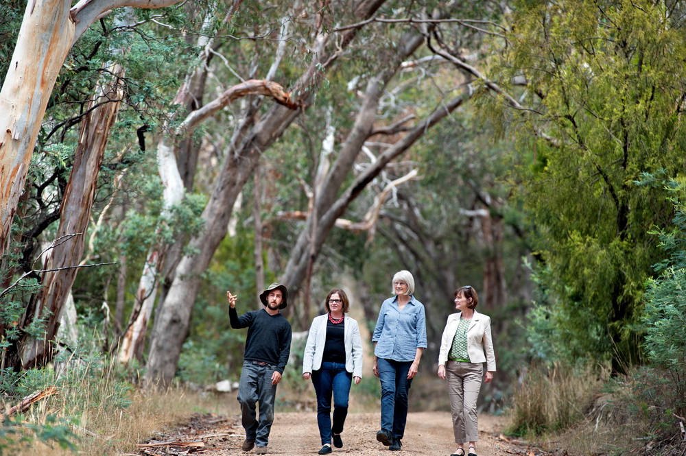 Ecologist Karl Just explains to Federal Member for Bendigo Lisa Chesters,Landcare Member Alice Aird,and State member for Macedon Mary-Anne Thomas how areas of remnant roadside vegetation in the Newham area contain endangered vegetation communities and threatened species,some of which are protected under Federal Legislation.Landcare groups are concerned that it is not receiving adequate protection.©Scheltema